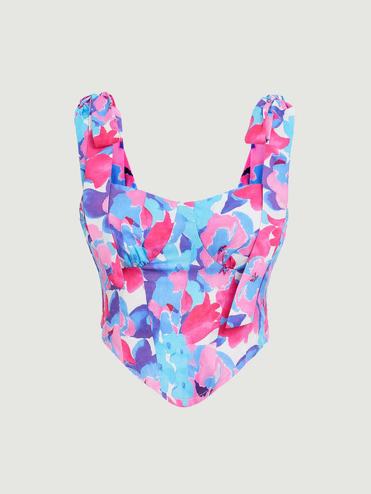 Supro kun flora ŝablono, nodo sur ŝultro, falbaloj