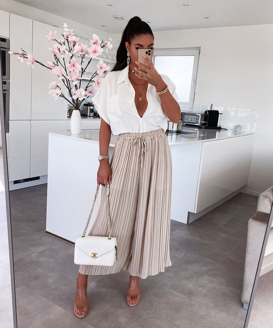 Plisitaj pantalonoj Mira Bejĝkoloraj