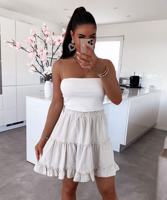 Muslina jupo Ines Bejĝkolora 