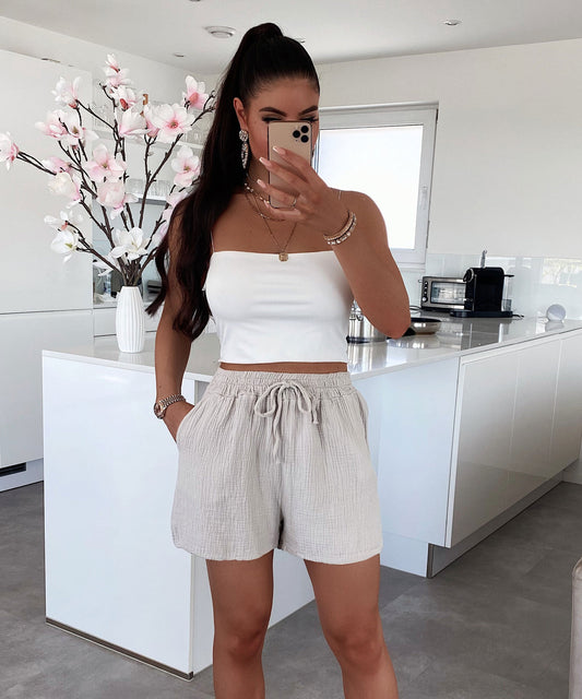 Muslinaj Pantalonetoj Bejĝaj